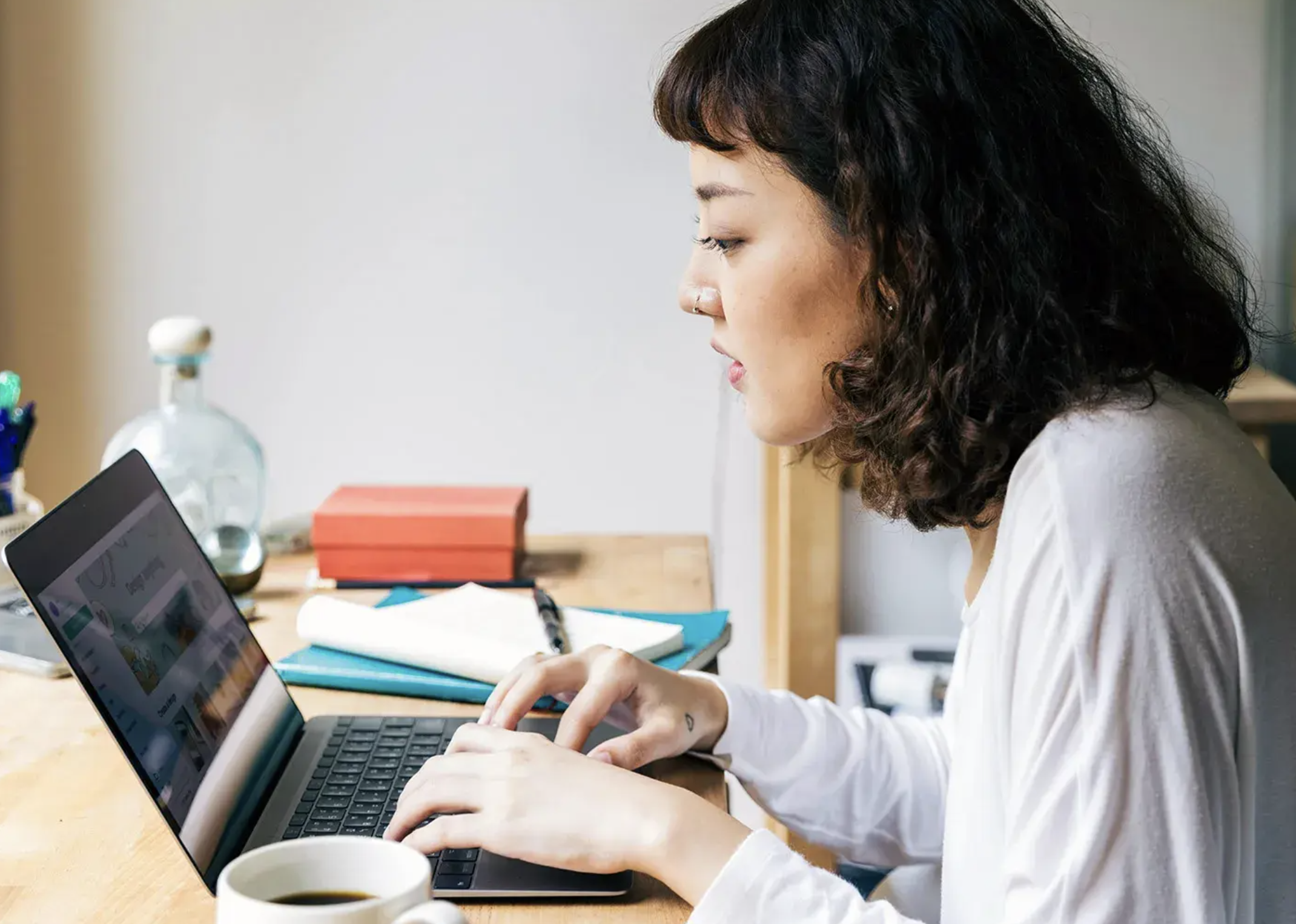 Support specialist working on laptop